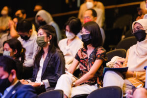 Participants note-taking during the conference